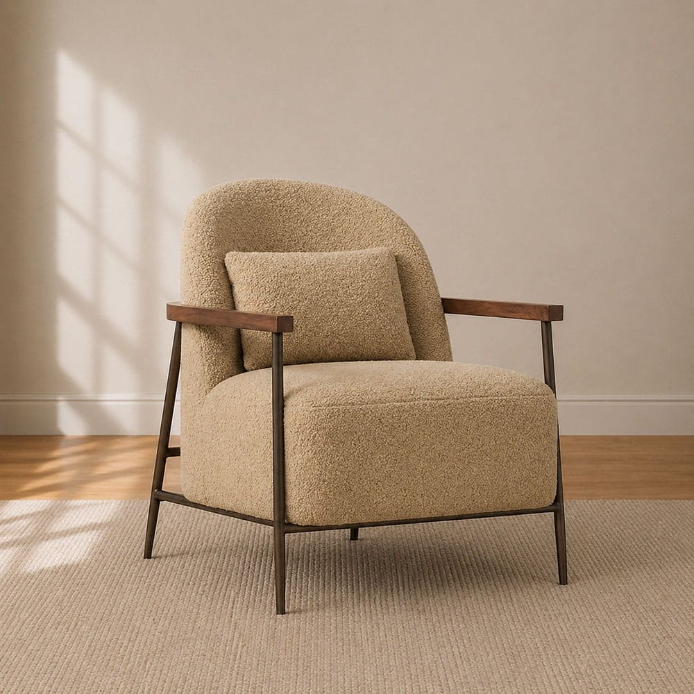 Beige upholstered accent chair with wooden arms in soft neutral space