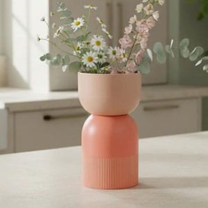 modern ceramic vase with flowers on table, minimalist home decor aesthetic