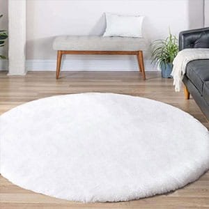 minimalist white round rug in modern bedroom interior, soft texture cozy decor
